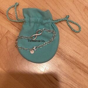 Tiffany & co. Infinity bracelet sterling silver never worn. 100% authentic.